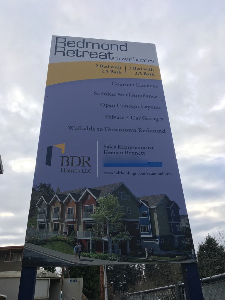 Redmond Retreat townhomes sign listing Keenan Bennett as sales representative